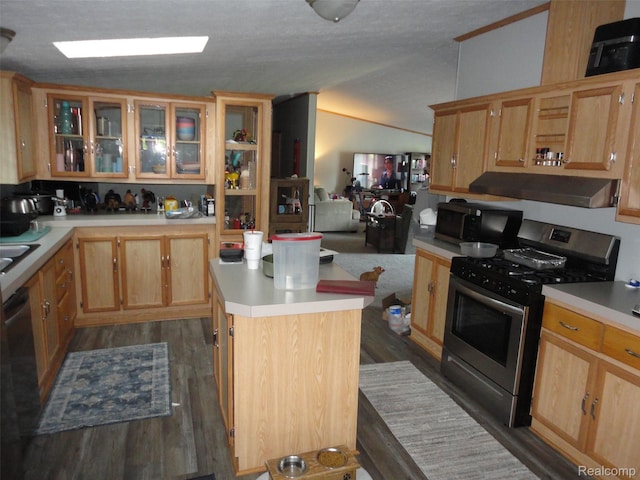 453 Glencoe Dr, Temperance, MI 48182 - kitchen with gas range, black microwave, range hood, dark wood-style floors, and vaulted ceiling