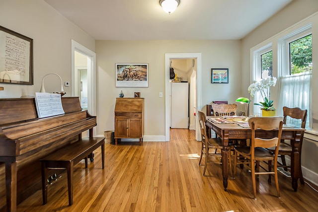809 Pauline Blvd, Ann Arbor, MI 48103 - dining space featuring light wood finished floors and baseboards