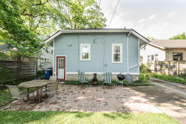 809 Pauline Blvd, Ann Arbor, MI 48103 - rear view of property featuring a patio and outdoor dining space