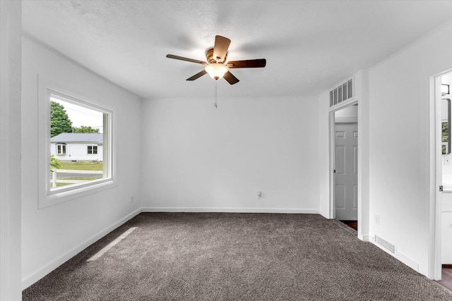 521 E Morrell St, Otsego, MI 49078 - unfurnished room with a ceiling fan and carpet