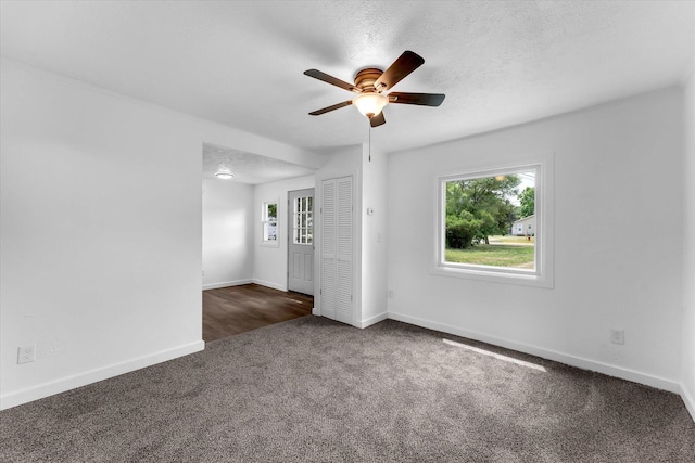 521 E Morrell St, Otsego, MI 49078 - spare room with a ceiling fan and carpet