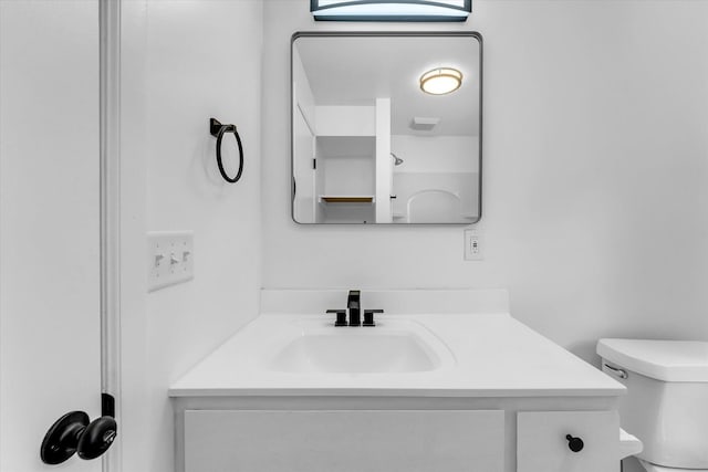 521 E Morrell St, Otsego, MI 49078 - bathroom featuring toilet and vanity
