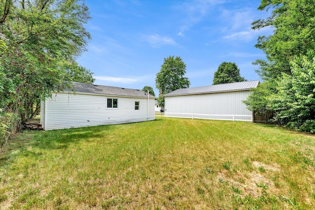 521 E Morrell St, Otsego, MI 49078 - view of green lawn with an outdoor structure