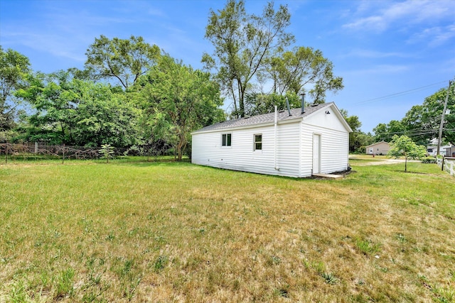 521 E Morrell St, Otsego, MI 49078 - view of green lawn with an outdoor structure