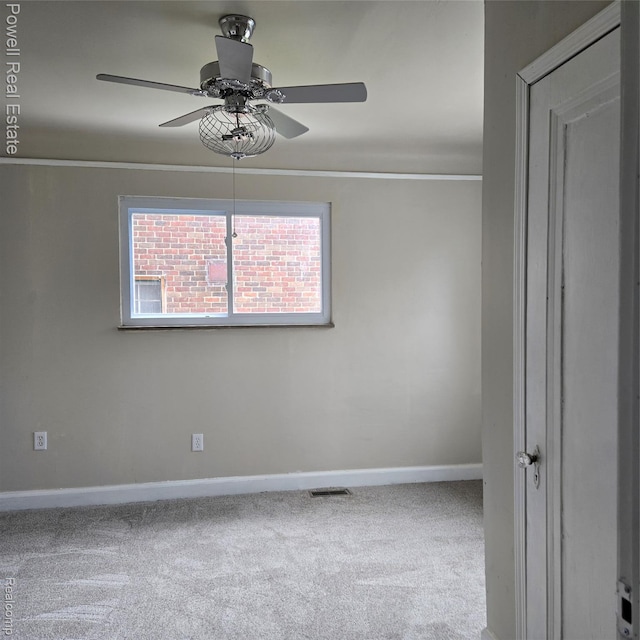 4670 Devonshire Rd, Detroit, MI 48224 - carpeted spare room featuring ornamental molding and ceiling fan