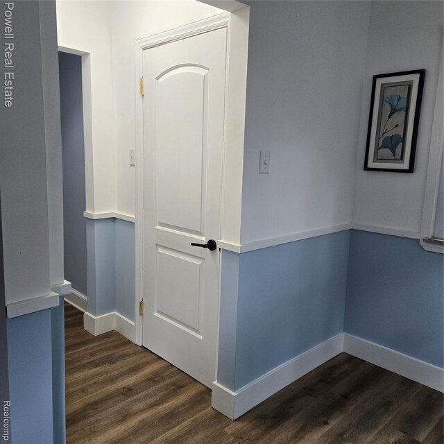 4670 Devonshire Rd, Detroit, MI 48224 - hall featuring dark wood finished floors and baseboards