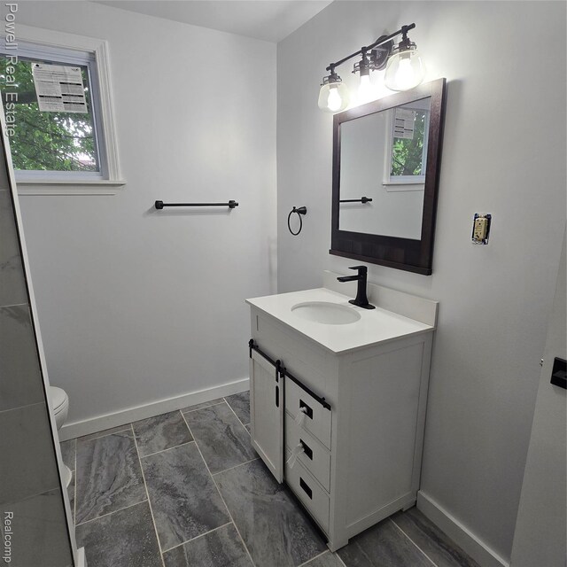 4670 Devonshire Rd, Detroit, MI 48224 - bathroom with vanity and toilet