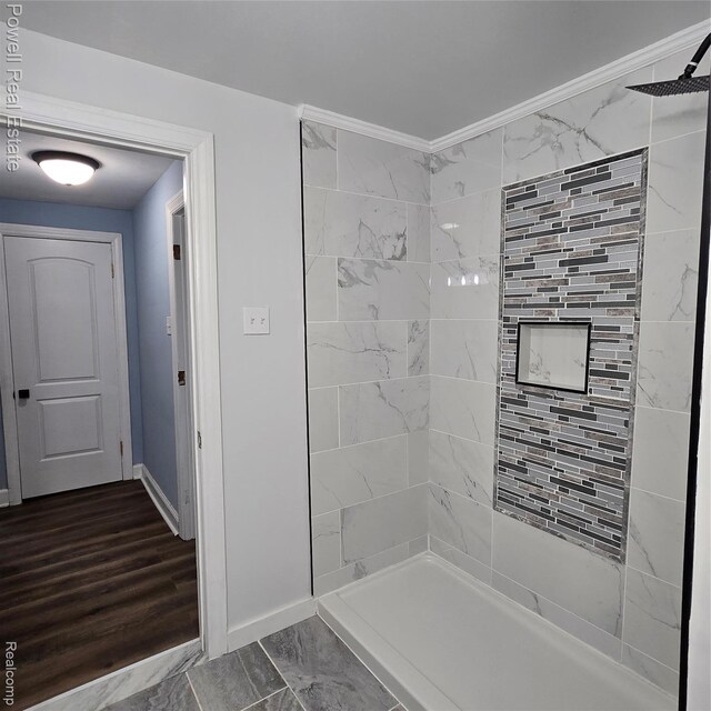 4670 Devonshire Rd, Detroit, MI 48224 - full bath featuring tiled shower and marble look tile flooring