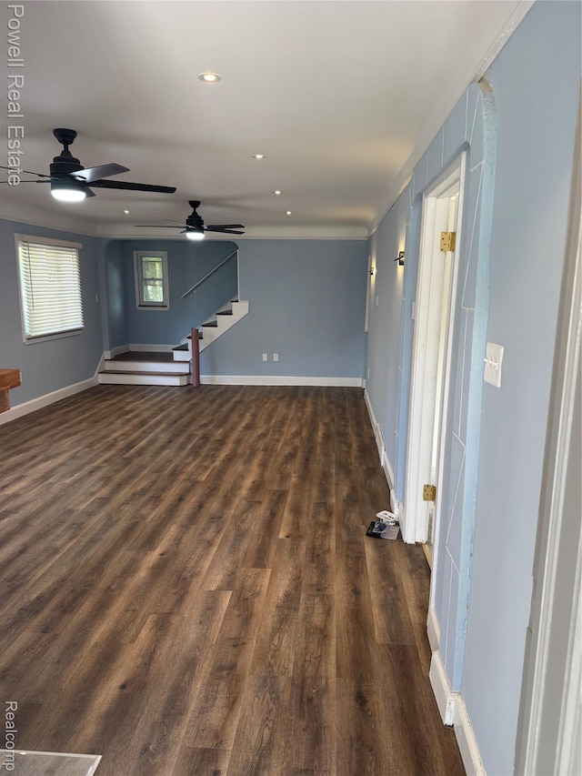 4670 Devonshire Rd, Detroit, MI 48224 - unfurnished living room with dark wood-type flooring, a ceiling fan, stairway, and recessed lighting
