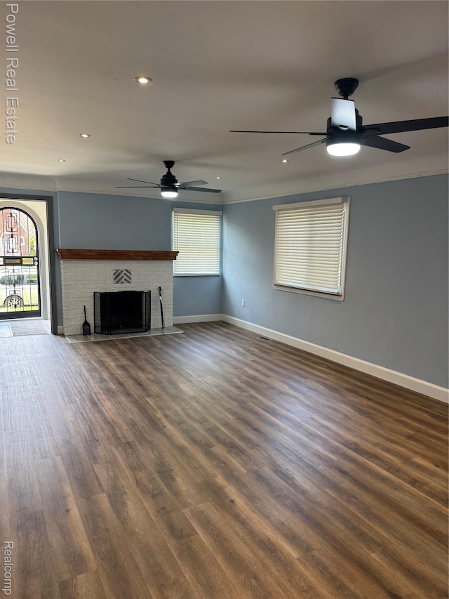 4670 Devonshire Rd, Detroit, MI 48224 - unfurnished living room with ceiling fan, recessed lighting, a fireplace, wood finished floors, and ornamental molding