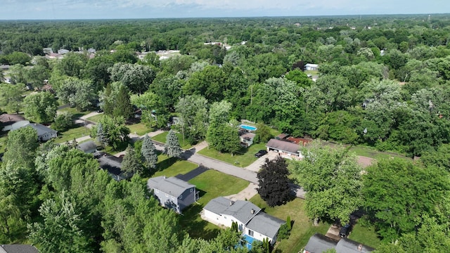 11427 Colonial Woods Dr, Clio, MI 48420 - aerial overview of property's location featuring a heavily wooded area