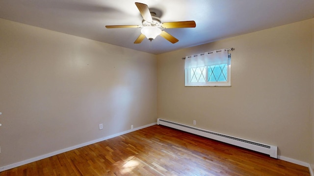 11427 Colonial Woods Dr, Clio, MI 48420 - empty room with baseboard heating, wood finished floors, and a ceiling fan