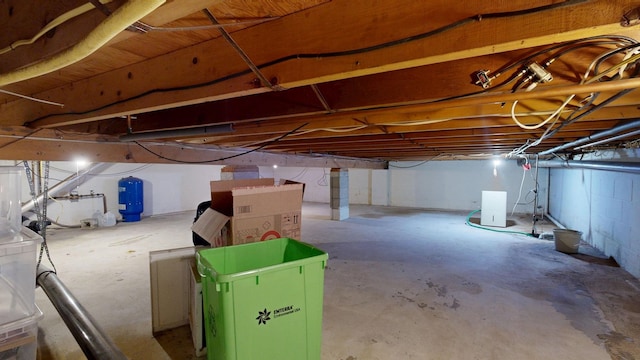 11427 Colonial Woods Dr, Clio, MI 48420 - unfinished below grade area with a water pressure tank