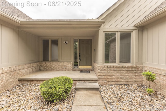 3145 Point Of The Woods Dr, West Bloomfield, MI 48324 - doorway to property featuring brick siding