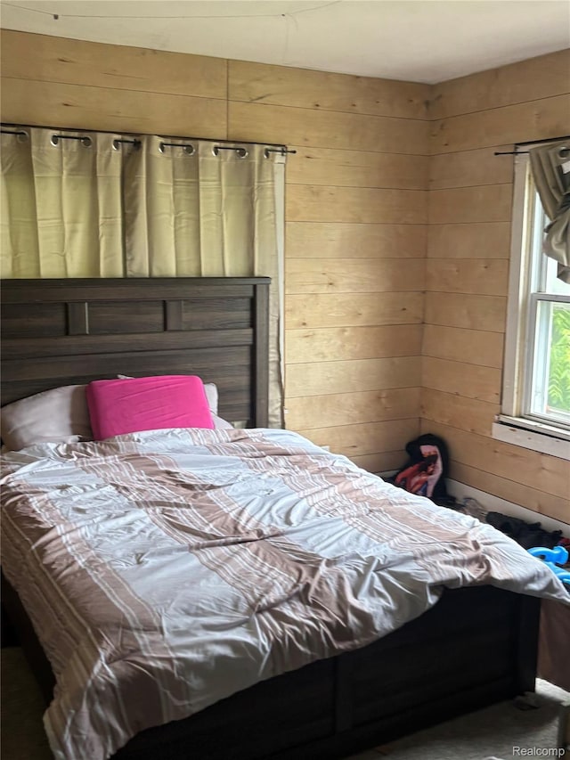 454 E Atherton Rd, Flint, MI 48507 - bedroom with wood walls