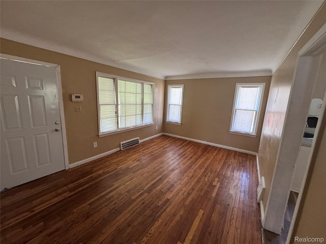 17370 Stout St, Detroit, MI 48219 - unfurnished living room with dark wood-style flooring and plenty of natural light