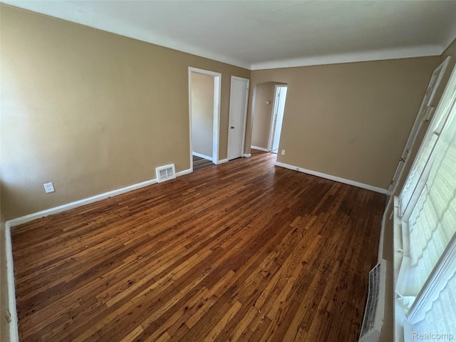 17370 Stout St, Detroit, MI 48219 - spare room featuring dark wood finished floors and baseboards