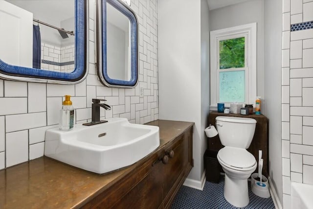 13176 Red Arrow Hwy, Sawyer, MI 49125 - full bathroom with tasteful backsplash, curtained shower, vanity, a tub, and tile patterned flooring