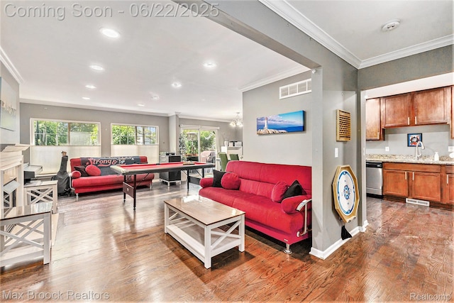 417 James Cir, Royal Oak, MI 48067 - living room featuring crown molding, wood finished floors, and recessed lighting