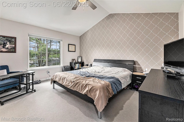 417 James Cir, Royal Oak, MI 48067 - carpeted bedroom featuring wallpapered walls, an accent wall, lofted ceiling, an office area, and a ceiling fan