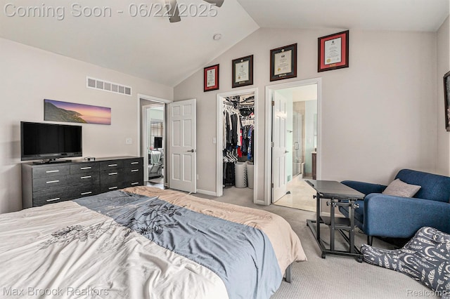 417 James Cir, Royal Oak, MI 48067 - bedroom featuring light carpet, a walk in closet, a closet, connected bathroom, and high vaulted ceiling