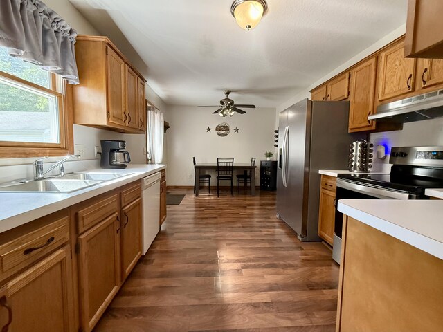 8021 Mclain Ave, Lambertville, MI 48144 - kitchen with appliances with stainless steel finishes, under cabinet range hood, ceiling fan, and light countertops
