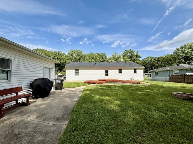 8021 Mclain Ave, Lambertville, MI 48144 - back of house featuring an outdoor fire pit, a deck, and a patio area