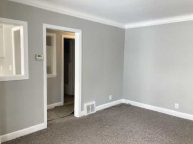 11751 Engleside St, Detroit, MI 48205 - carpeted spare room with baseboards and ornamental molding