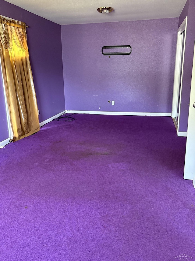 644 S 26th St, Saginaw, MI 48601 - carpeted spare room featuring baseboards