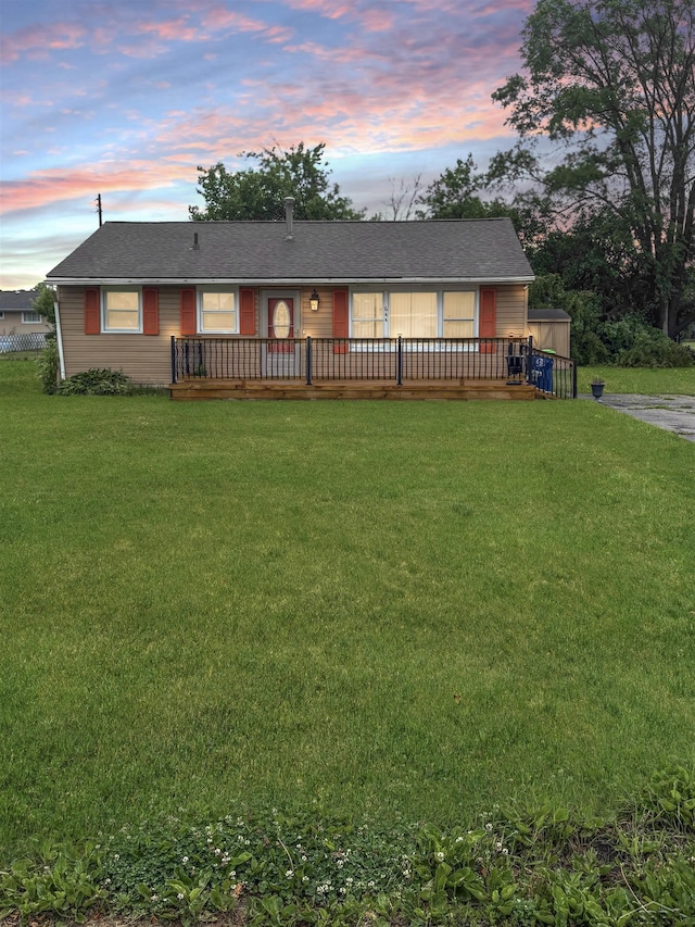 644 S 26th St, Saginaw, MI 48601 - single story home with a wooden deck and a yard