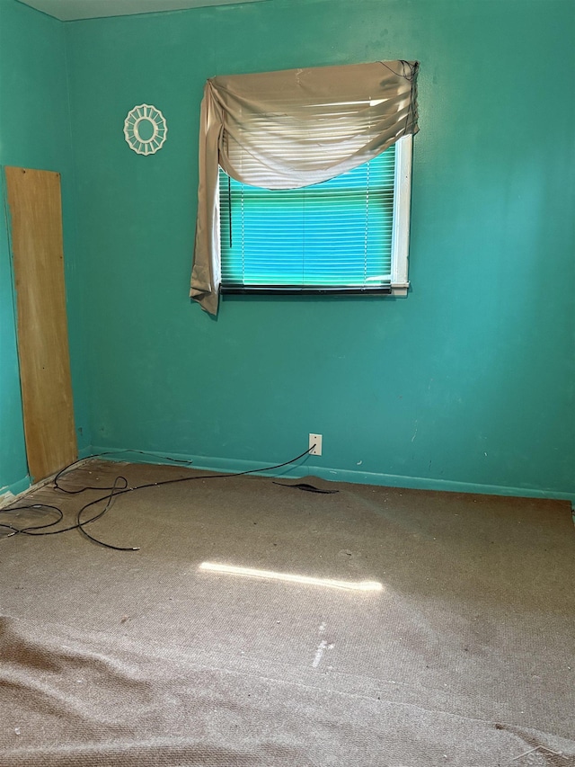 644 S 26th St, Saginaw, MI 48601 - carpeted spare room with baseboards