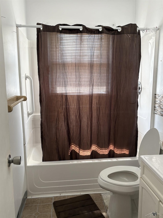 644 S 26th St, Saginaw, MI 48601 - full bathroom with vanity, tile patterned floors, and shower / bath combo