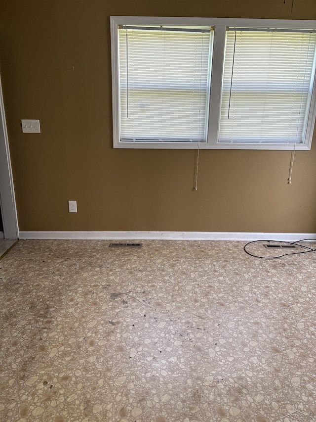 644 S 26th St, Saginaw, MI 48601 - unfurnished room featuring baseboards