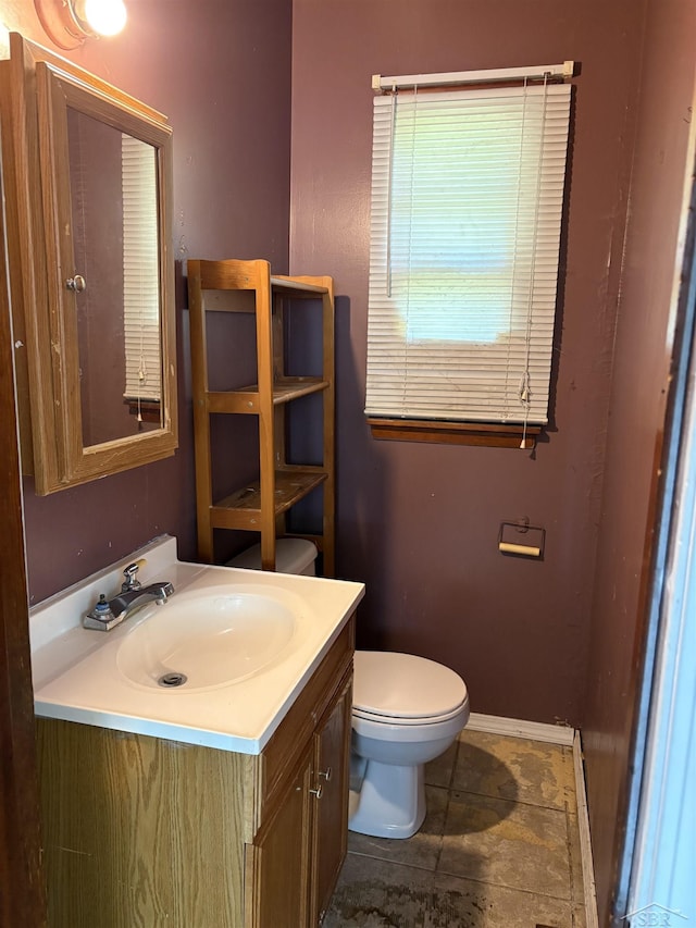 644 S 26th St, Saginaw, MI 48601 - bathroom featuring vanity and toilet