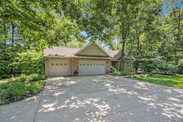 3314 Westview Ct, Allegan, MI 49010 - view of front of house with concrete driveway and a garage