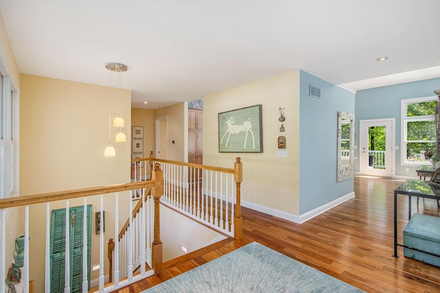 3314 Westview Ct, Allegan, MI 49010 - hall with an upstairs landing, wood finished floors, and recessed lighting