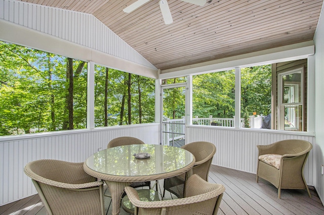 3314 Westview Ct, Allegan, MI 49010 - sunroom / solarium with ceiling fan, vaulted ceiling, outdoor dining area, and view of wooded area