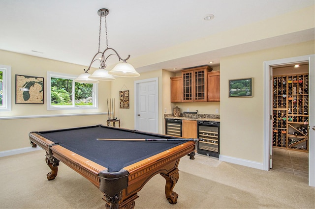 3314 Westview Ct, Allegan, MI 49010 - recreation room with beverage cooler, wet bar, light colored carpet, and recessed lighting