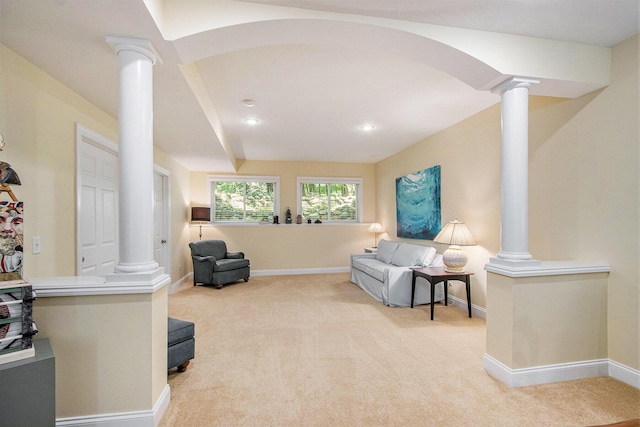 3314 Westview Ct, Allegan, MI 49010 - carpeted living area with decorative columns and baseboards