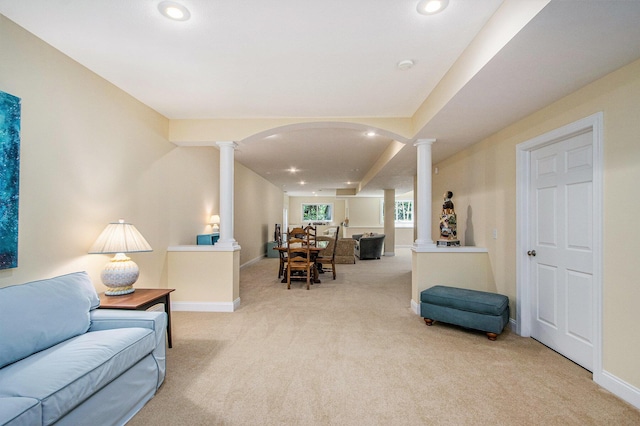 3314 Westview Ct, Allegan, MI 49010 - living area with decorative columns, carpet flooring, recessed lighting, and arched walkways