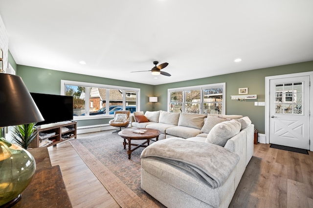 1908 Niles Ave, Saint Joseph, MI 49085 - living room with baseboard heating, ceiling fan, wood finished floors, and recessed lighting