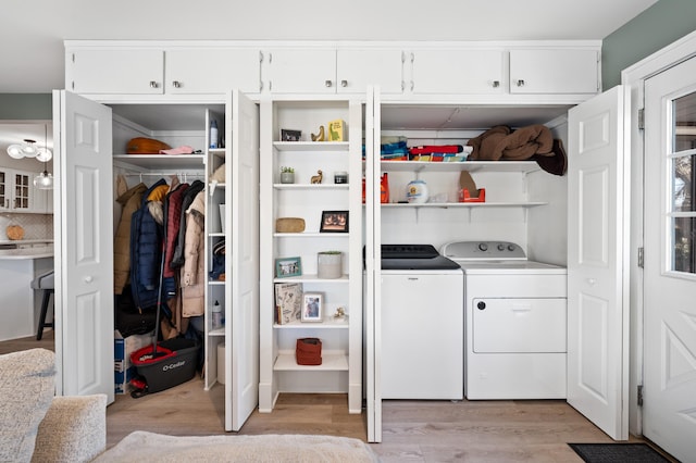 1908 Niles Ave, Saint Joseph, MI 49085 - laundry area featuring washer and clothes dryer and light wood-style floors