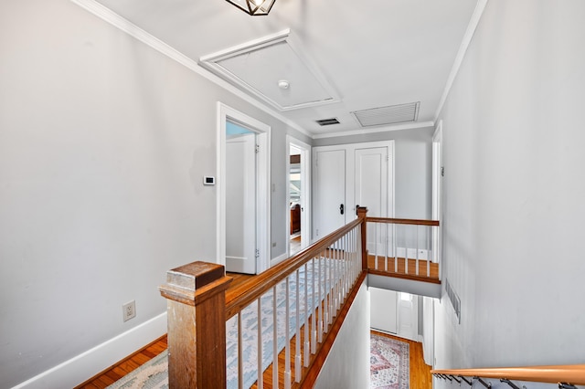 1908 Niles Ave, Saint Joseph, MI 49085 - stairs with attic access, wood finished floors, and ornamental molding