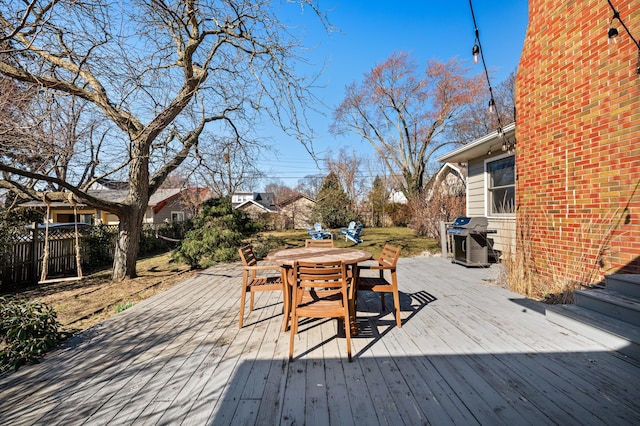 1908 Niles Ave, Saint Joseph, MI 49085 - wooden deck featuring outdoor dining space and a grill