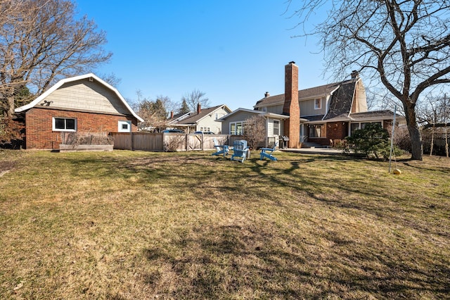 1908 Niles Ave, Saint Joseph, MI 49085 - rear view of property with a chimney, brick siding, and a barn