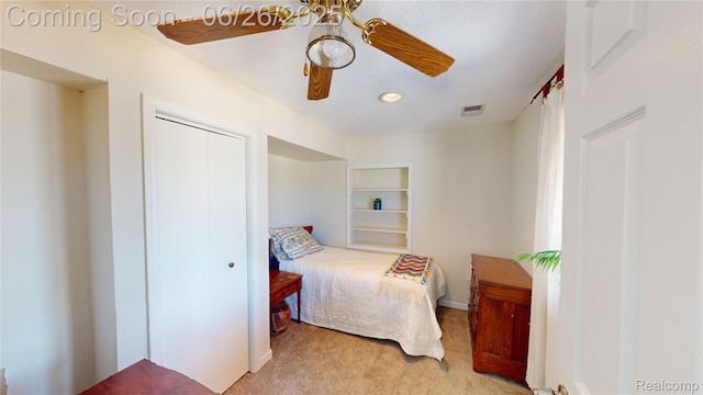 3971 S Shore Dr, Lapeer, MI 48446 - bedroom featuring carpet, a closet, and a ceiling fan