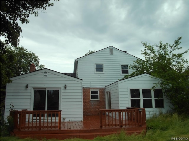 38014 Mallast St, Harrison Township, MI 48045 - rear view of property with a wooden deck and brick siding