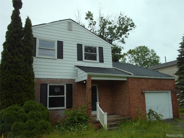 38014 Mallast St, Harrison Township, MI 48045 - view of front of house with a garage and brick siding