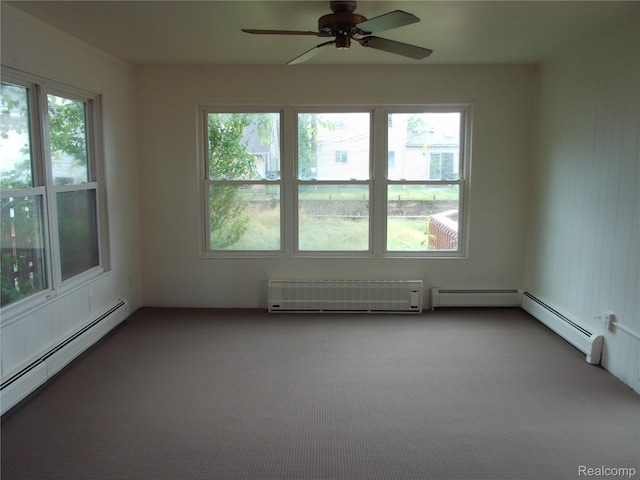 38014 Mallast St, Harrison Township, MI 48045 - empty room with a baseboard radiator, carpet flooring, and healthy amount of natural light