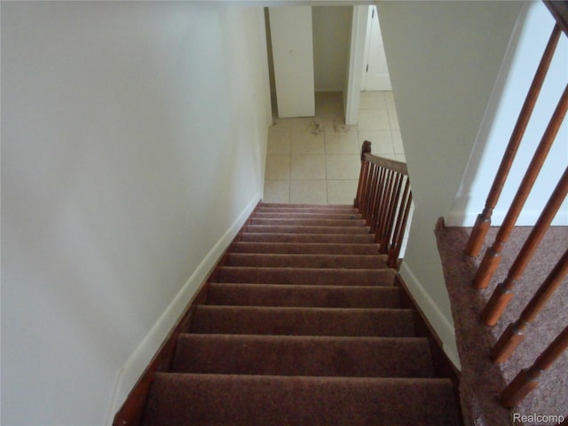 38014 Mallast St, Harrison Township, MI 48045 - stairway featuring baseboards and tile patterned flooring